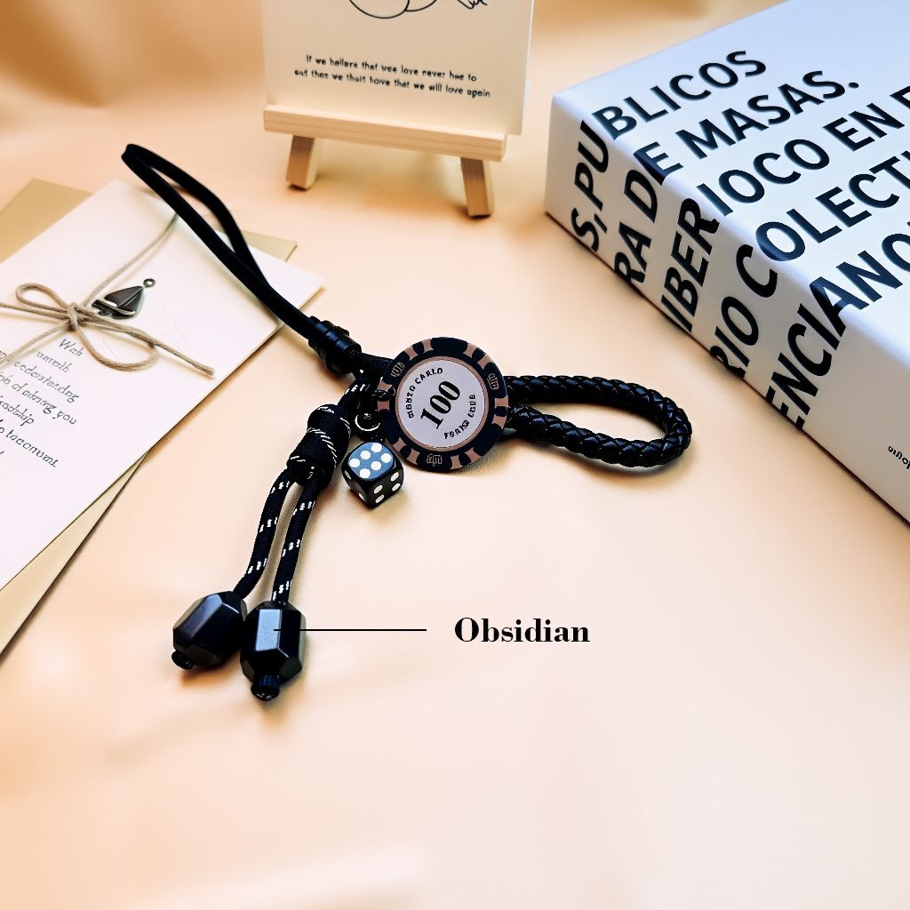 Black braided leather bag charm with obsidian gemstone beads, custom opportunity dice and poker chip, luxury wealth blessing and protection keychain, personalized lucky charm accessory for purse or backpack