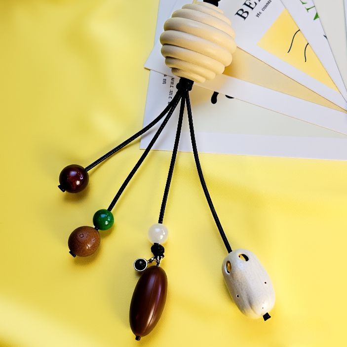 Handmade bohemian style bag charm chain with colorful beads and tassel, featuring custom name pendant, perfect personalized accessory for bags and keys, meaningful gift for couples and loved ones