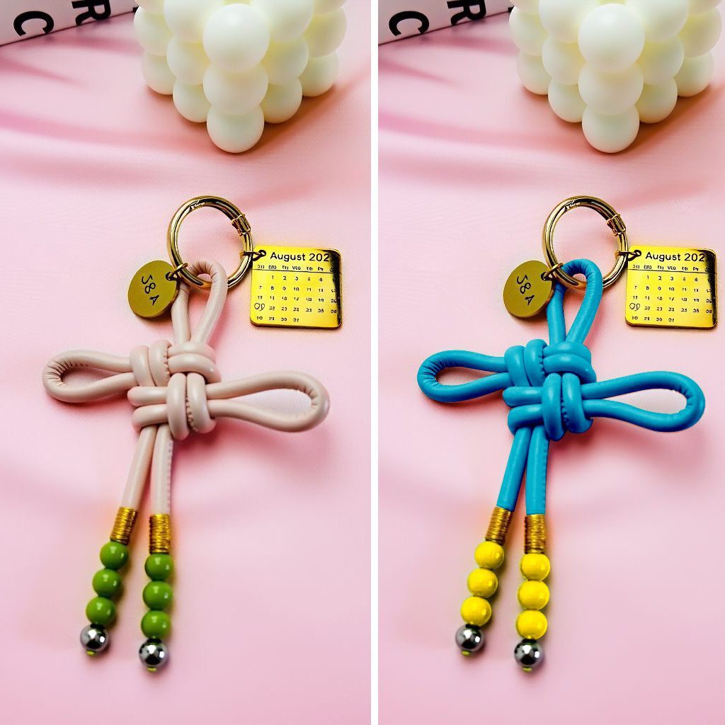 Handwoven leather love knot bag charms for couples, custom name initials and anniversary date, personalized romantic keychain set, love and connection collection, stylish bag accessories for him and her