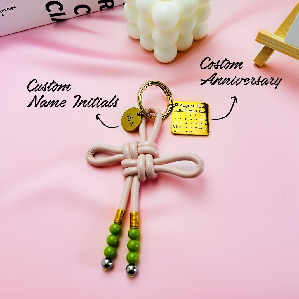Handwoven leather love knot bag charm with custom name initials and anniversary date, personalized couple keychain, romantic gift accessory, love and connection collection, stylish purse pendant for women