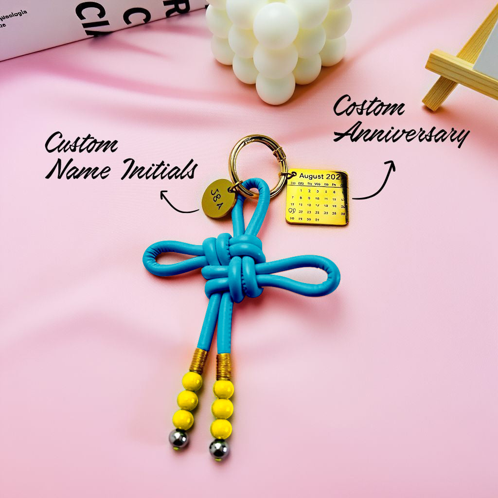 Men's handwoven leather love knot bag charm with custom name initials and anniversary date, personalized men's keychain, romantic gift for him, love and connection collection, stylish purse pendant for men