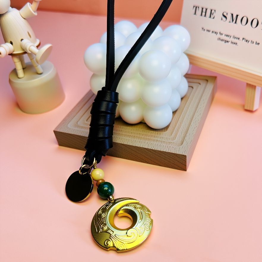 Elegant brass fortune totem charm with green agate and steel beads, a personalized keychain accessory infused with positive energy