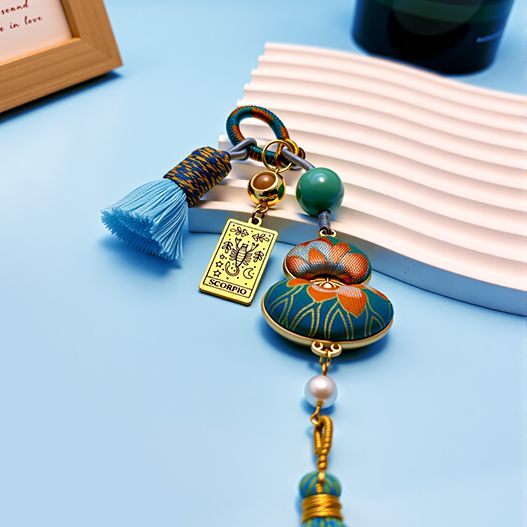 Handmade Song brocade Scorpio zodiac guardian bag charm with blue tassel and gemstone bead, lucky protection amulet for bags