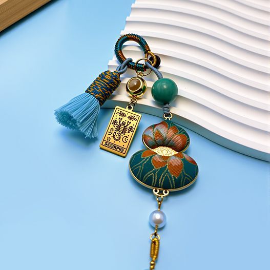 Scorpio constellation zodiac guardian bag accessory in blue Song brocade, handmade with pearl and tassel, spiritual lucky charm