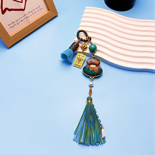 Blue Song brocade Scorpio zodiac bag charm, handmade lucky pendant with gemstone details and tassel, symbol of fortune and energy