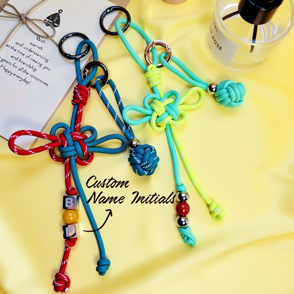 Hand-braided lucky knot fortune ball bag charm with custom name-initial beads, red/teal & lime colorways (bagcharms)