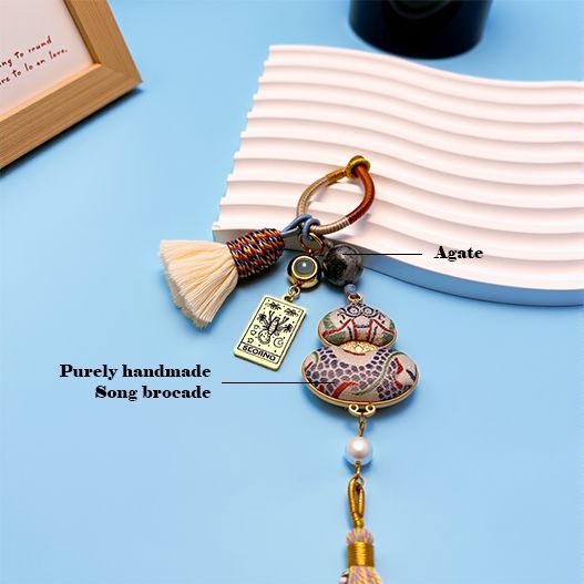 Scorpio zodiac guardian bag charm featuring agate stone and handmade Song brocade fabric, artisanal astrology protection keychain for good fortune.